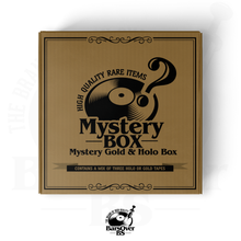 Load image into Gallery viewer, Gold Mystery Box (A Mix Of 3 Gold/Holographic Cassette Tapes) (LIMITED TO 2 BOXES PER PERSON)
